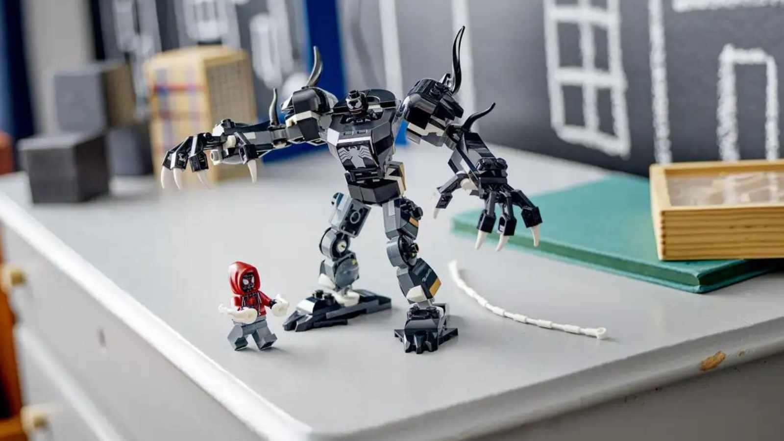 LEGO Marvel Venom Mech Armor vs. Miles Morales set on display