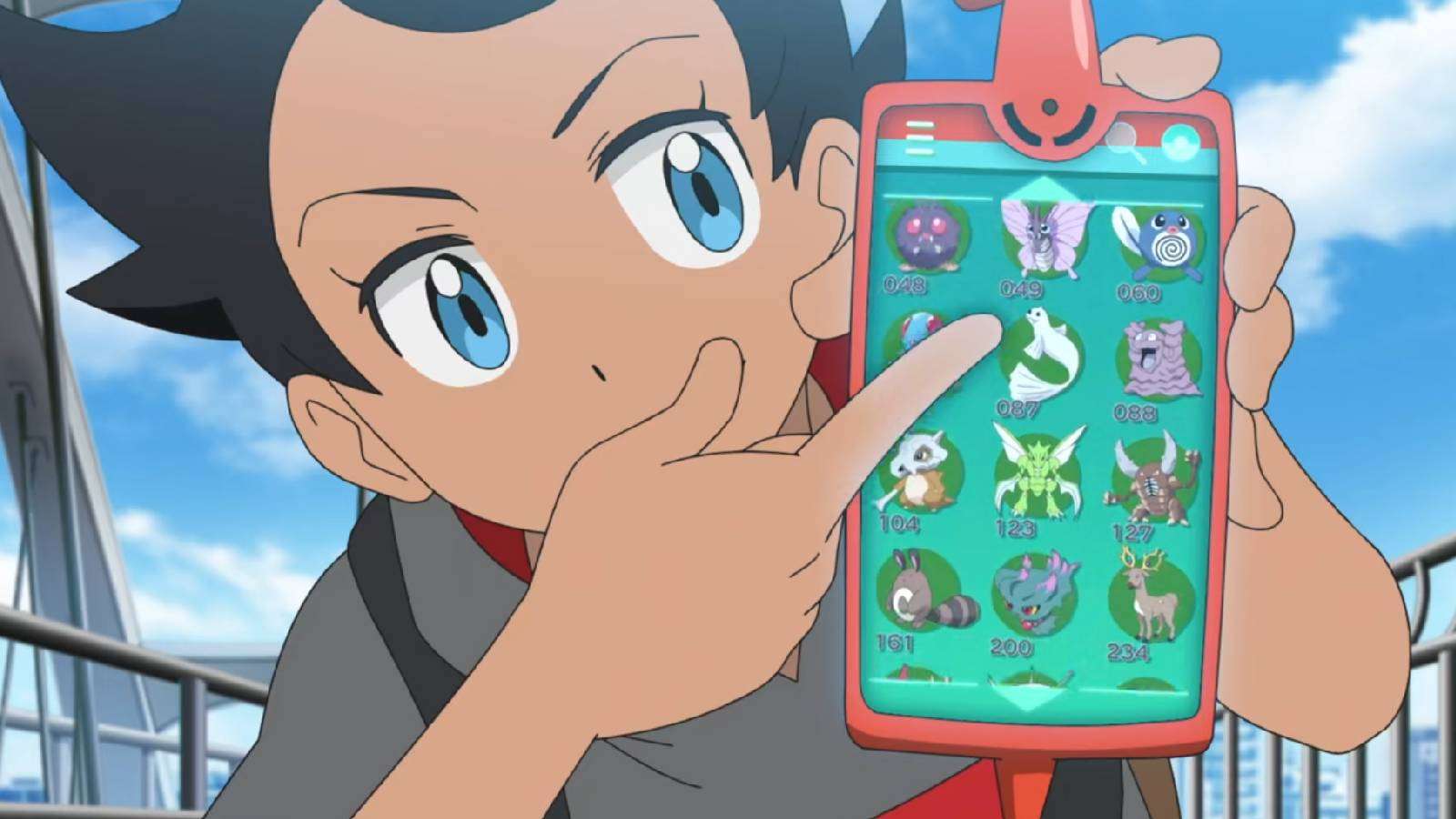 The Pokemon trainer Goh points to their Pokedex and collection of Pokemon