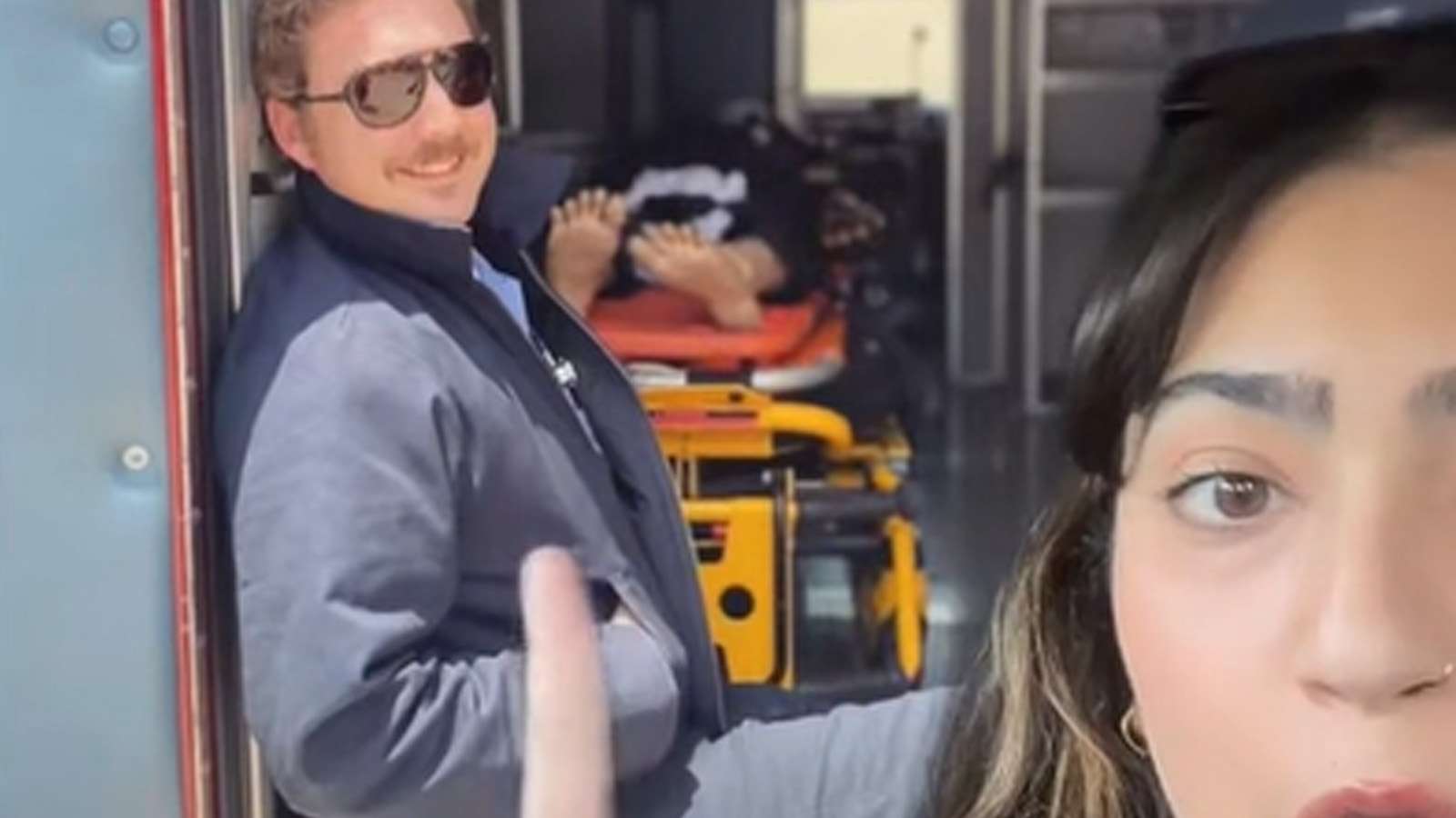 Woman shocked after discovering EMT's Hinge photo has a body in the background