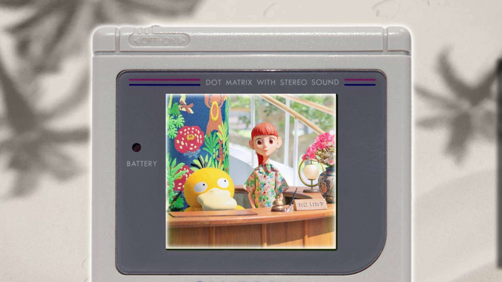 A Game Boy is visible, with key art for Pokemon Concierge pictured on the screen