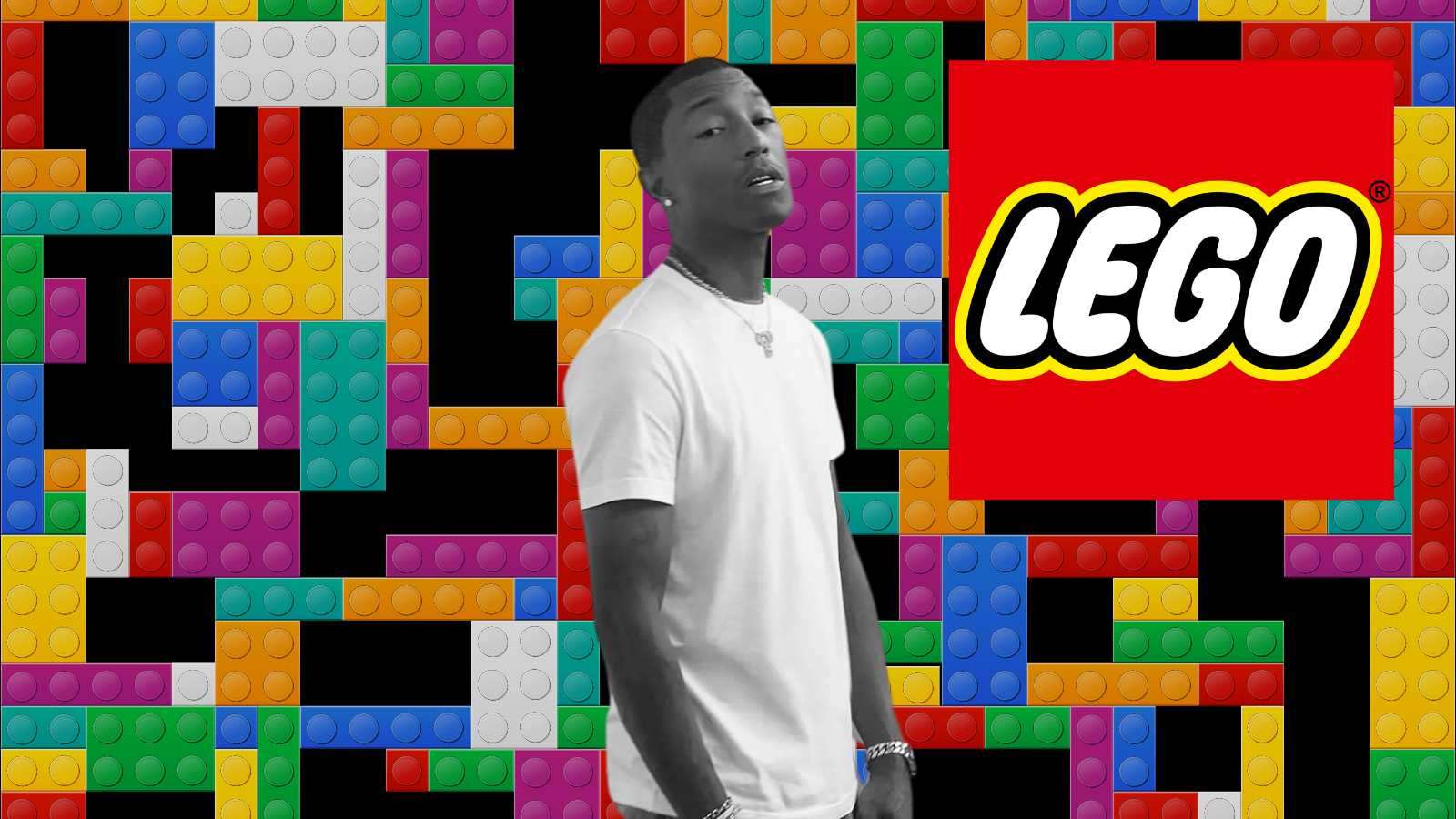 Pharrell Williams in front of a LEGO-bricks background.