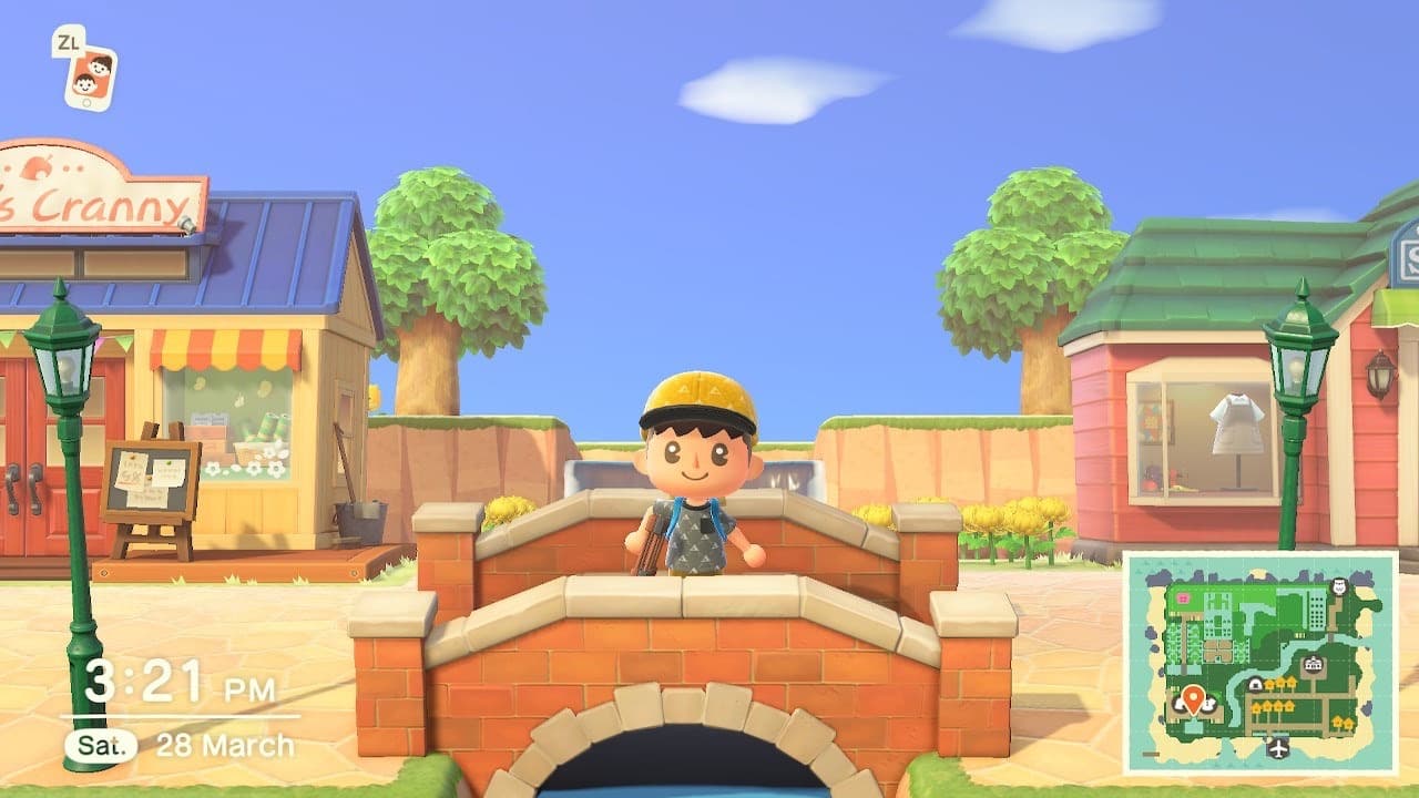 An image of a character standing on a bridge in a town island layout in Animal Crossing new horizons