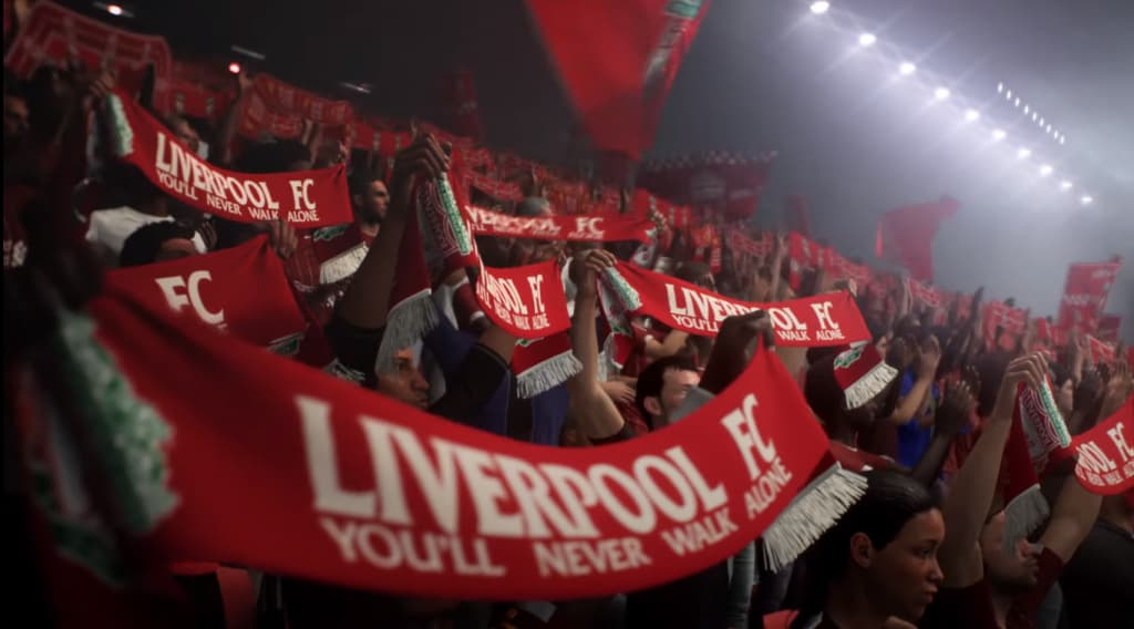 Liverpool supporters cheering in next-generation FIFA 21 stadium.