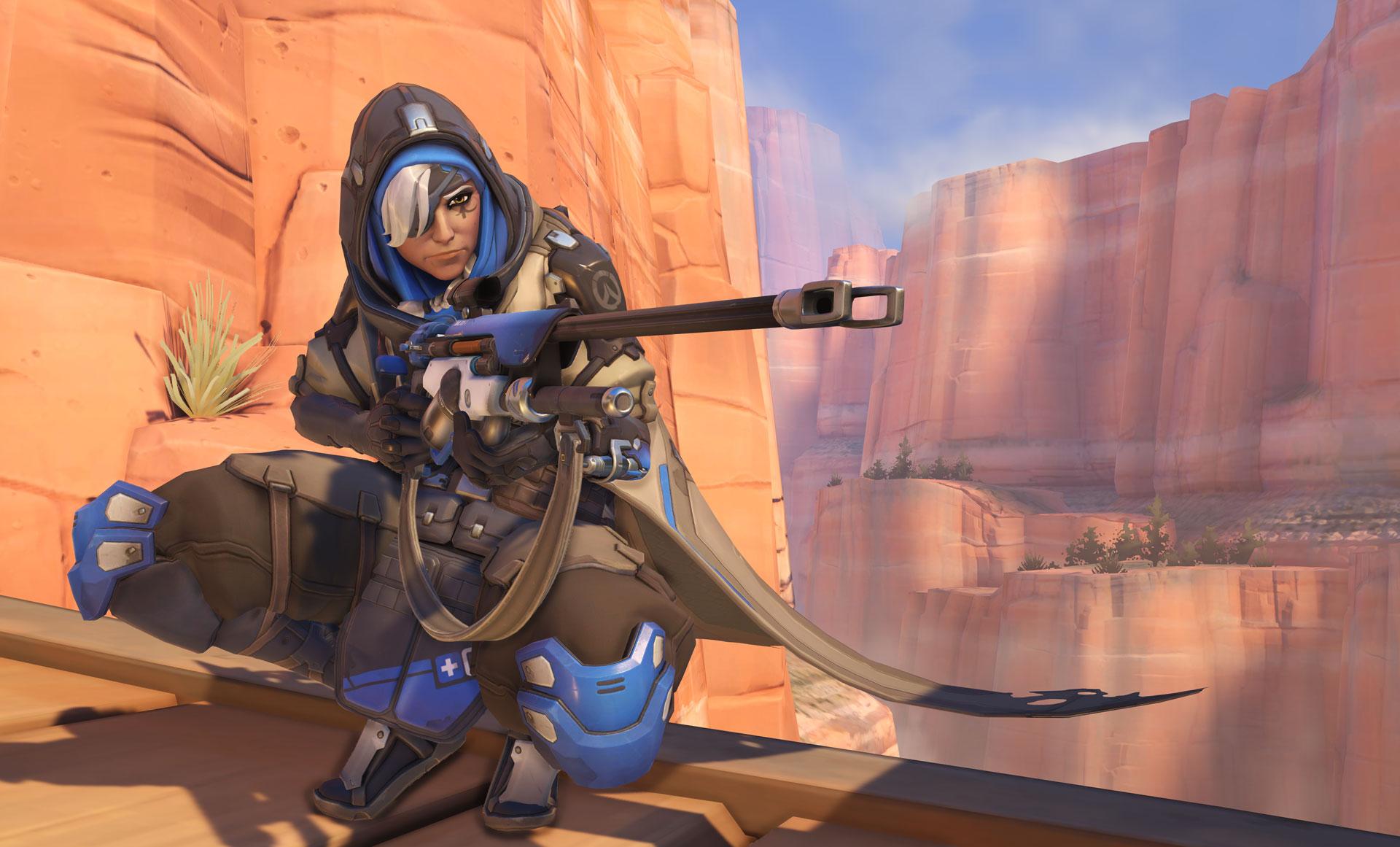 Ana crouching on Route 66 in Overwatch