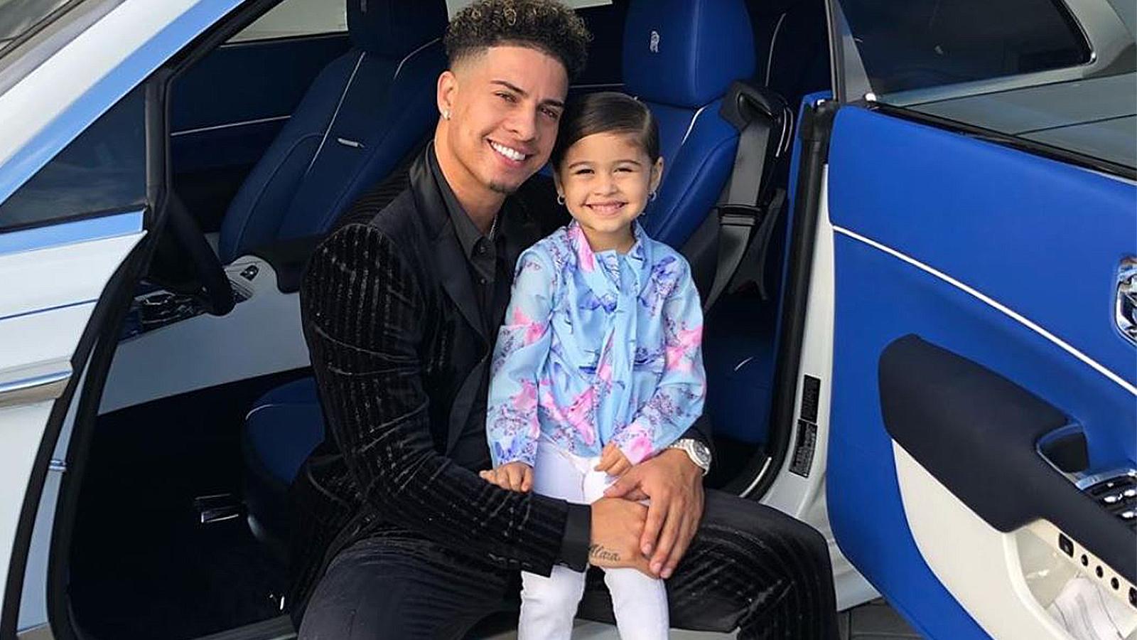 ACE Family's Austin McBroom poses with daughter Elle in a car.