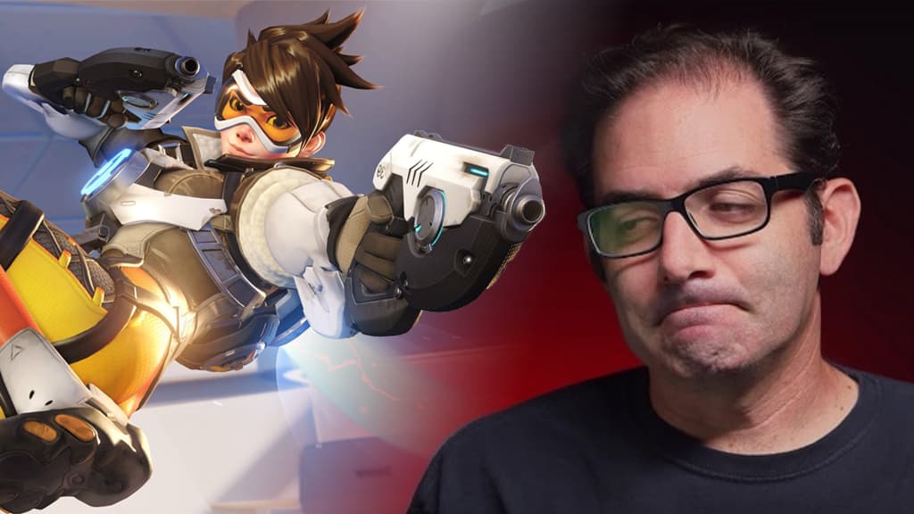 Tracer from Overwatch side by side with grimacing Jeff Kaplan