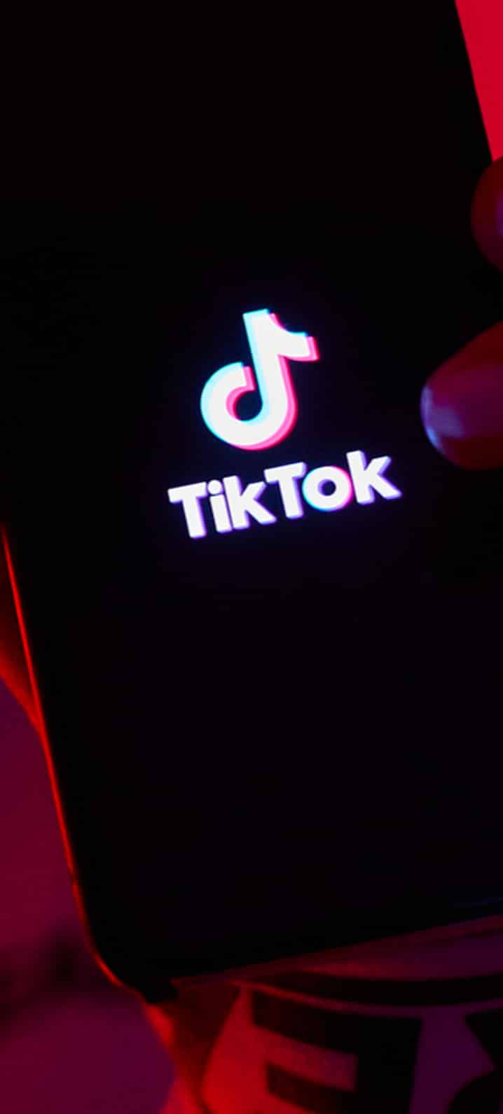 TikTok logo on a phone screen