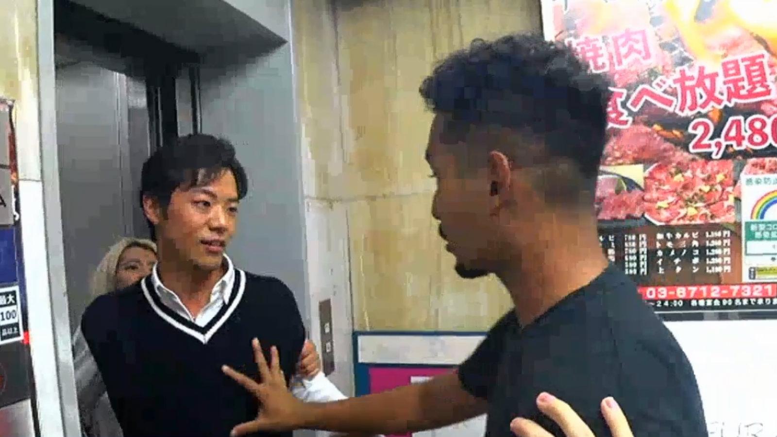 Two men fight in an elevator in Japan