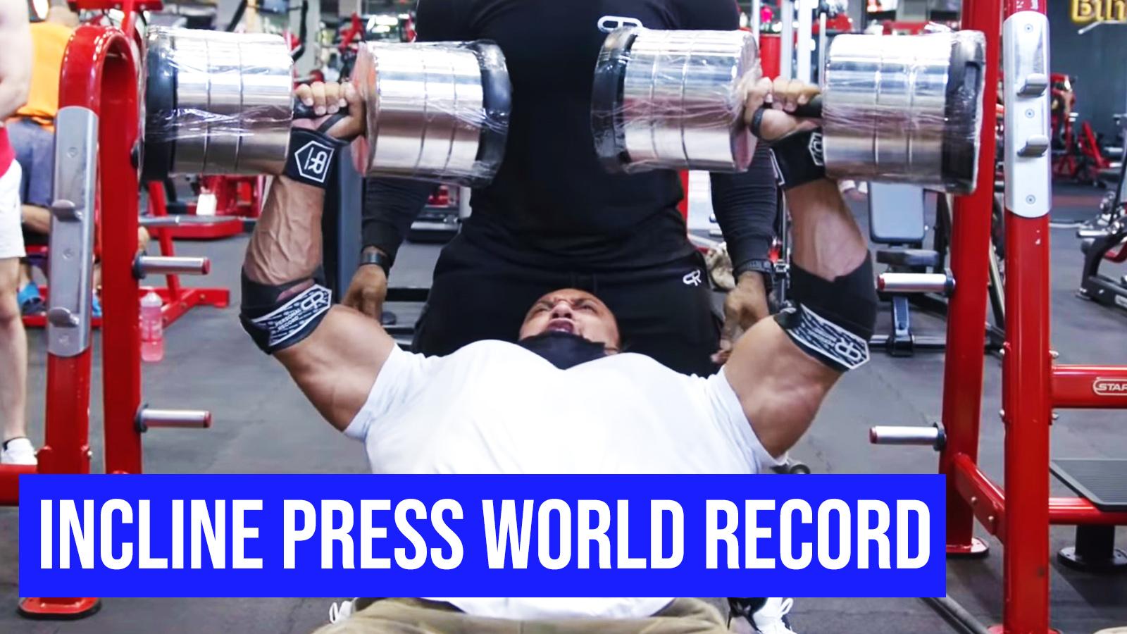 Larry Wheels pressing 242 lbs for reps.