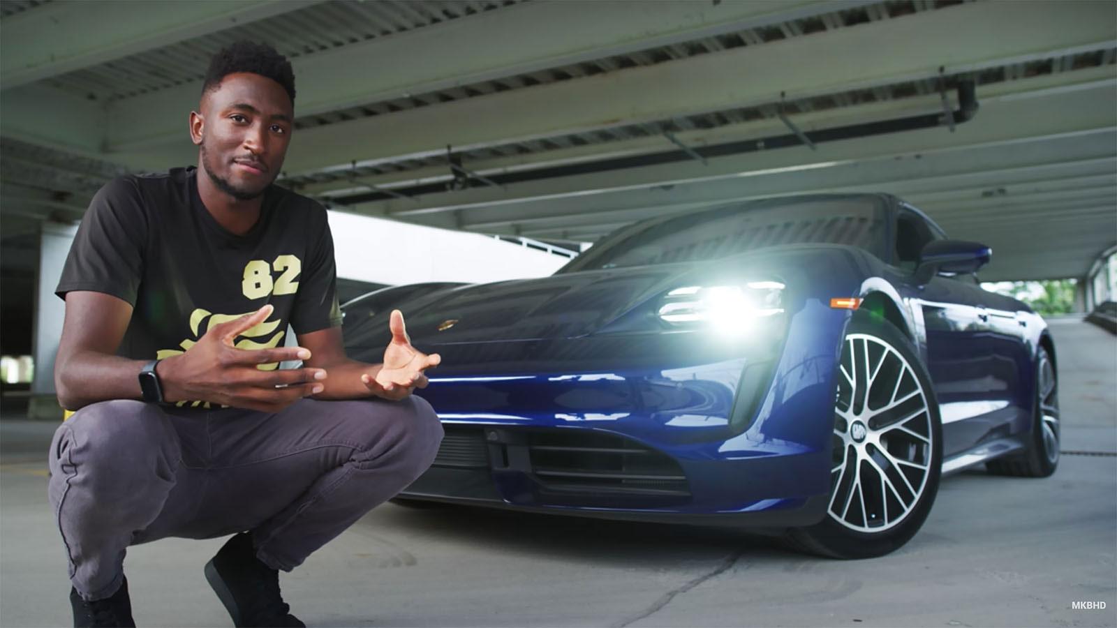 Marques Brownlee crouching in front of carYouTube: Marques Brownlee