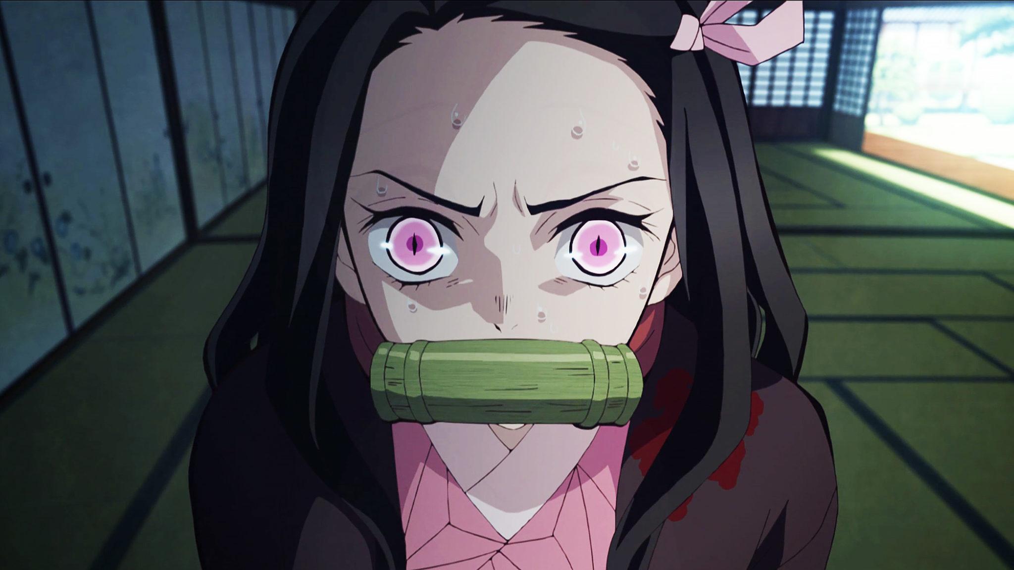 Screenshot of Nezuko angry in Demon Slayer anime.