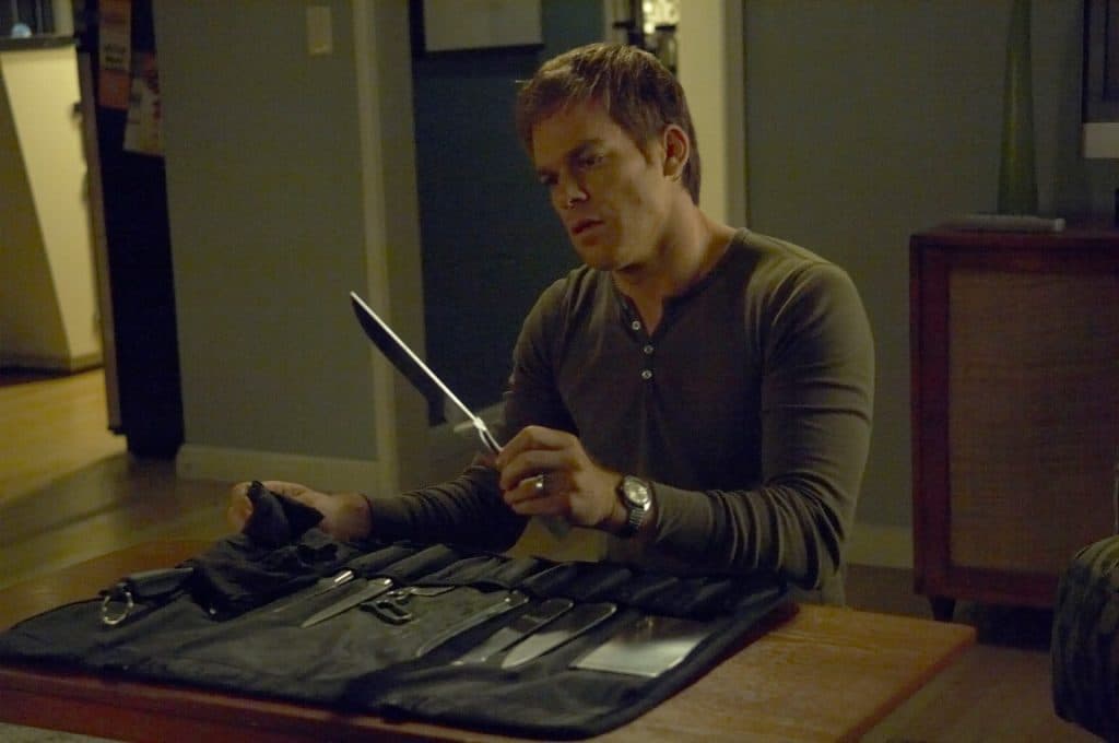 Dexter looks through his knives