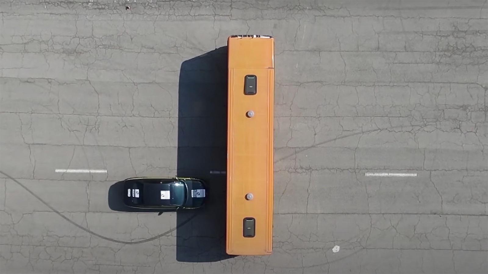Bus and car crash test aerial view