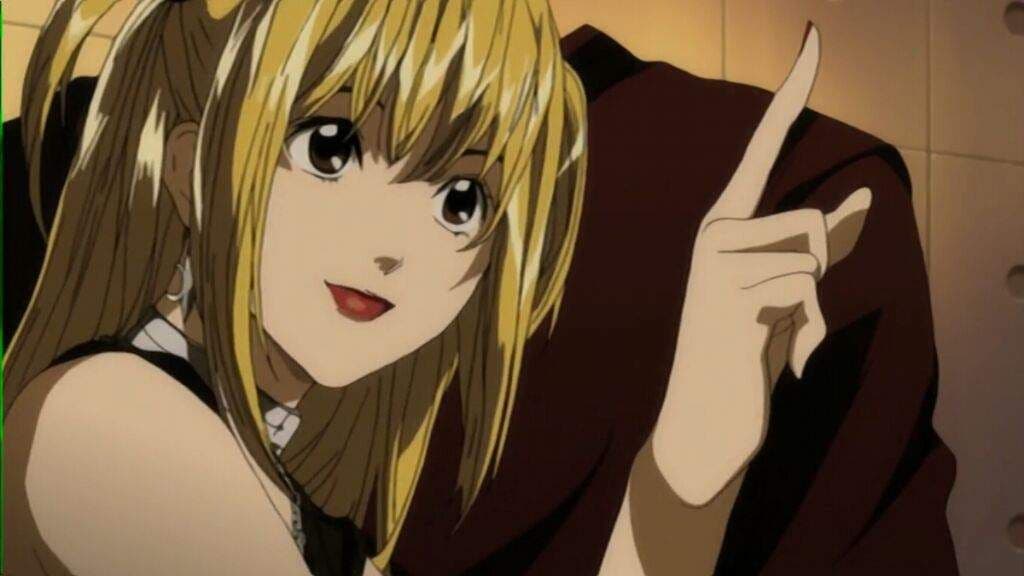 Misa Amane holds up a pointer finger in a still from Death Note.