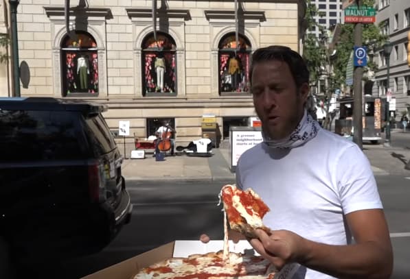 Dave Portnoy eats pizza for a review