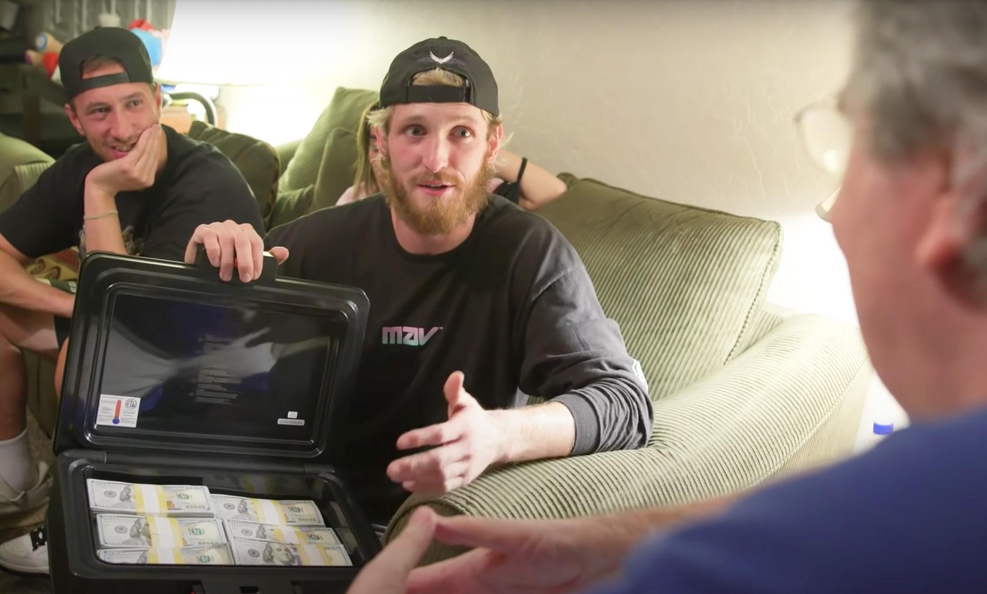 logan paul offering gary from pawn stars a briefcase of cash