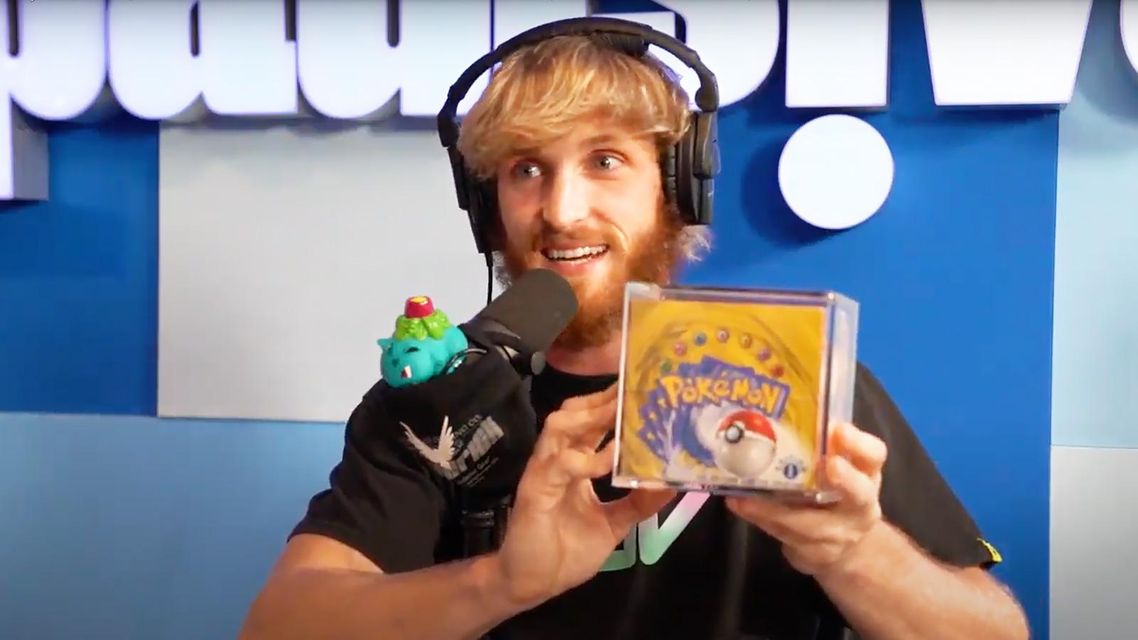 logan paul with pokemon card booster box