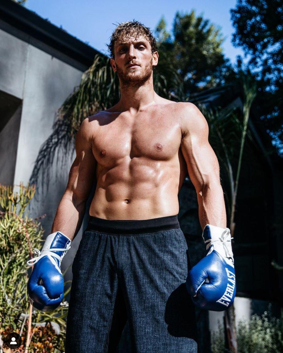 Logan Paul poses in boxing gear.
