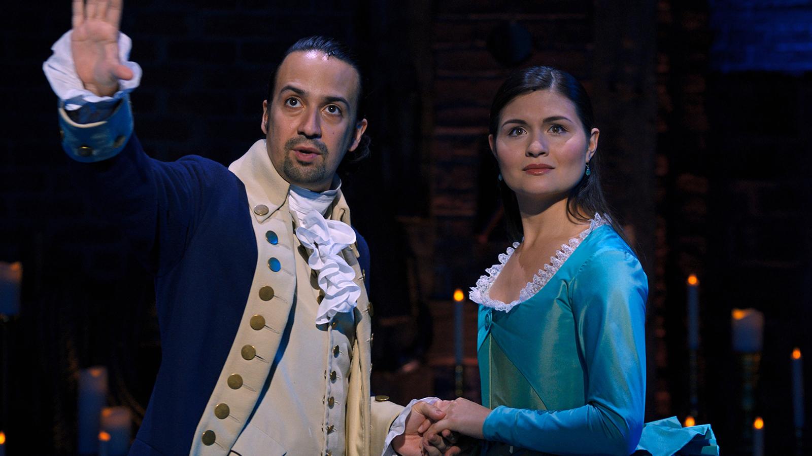 Lin-Manuel Miranda appears as Hamilton alongside Phillipa Soo as Eliza.