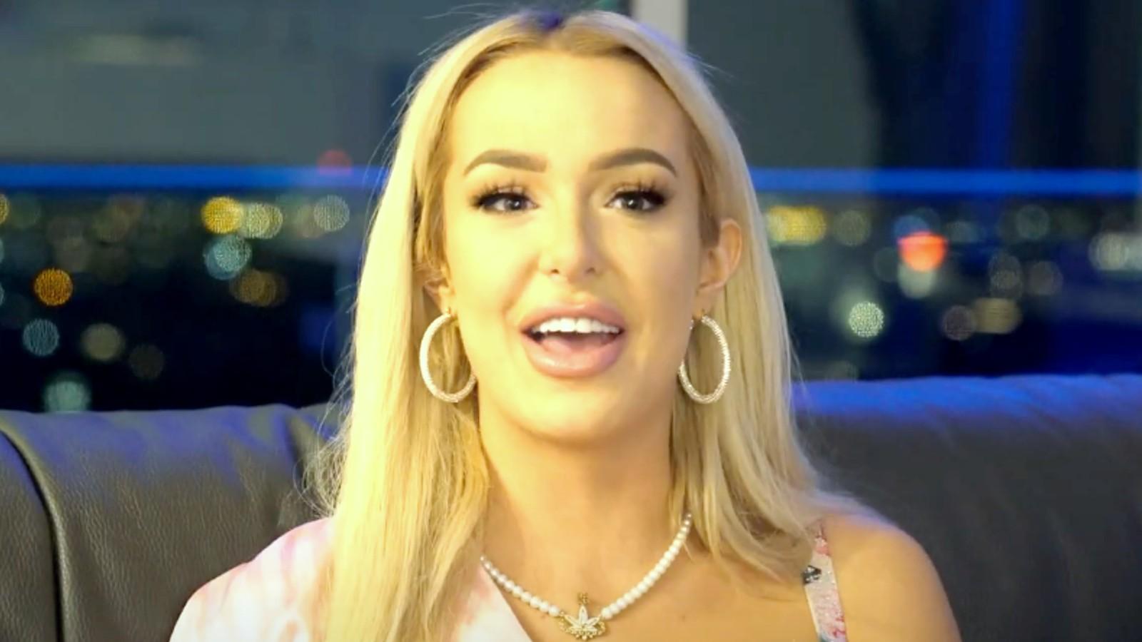 Tana Mongeau sits facing the camera in a storytime video