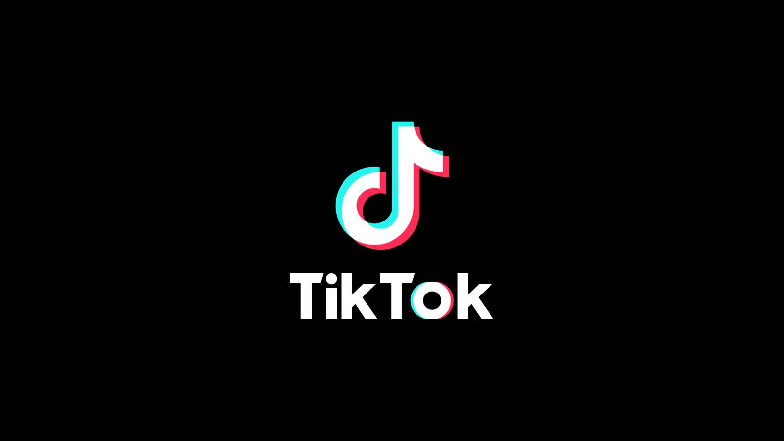 The TikTok logo on a black screen