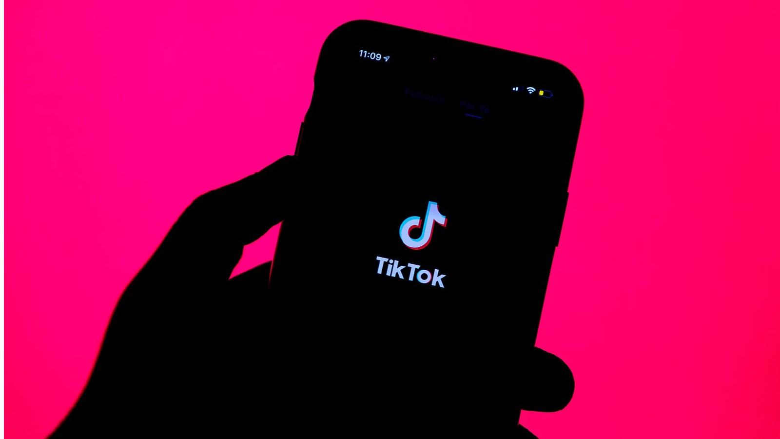 TikTok loading page on a phone with a bright background