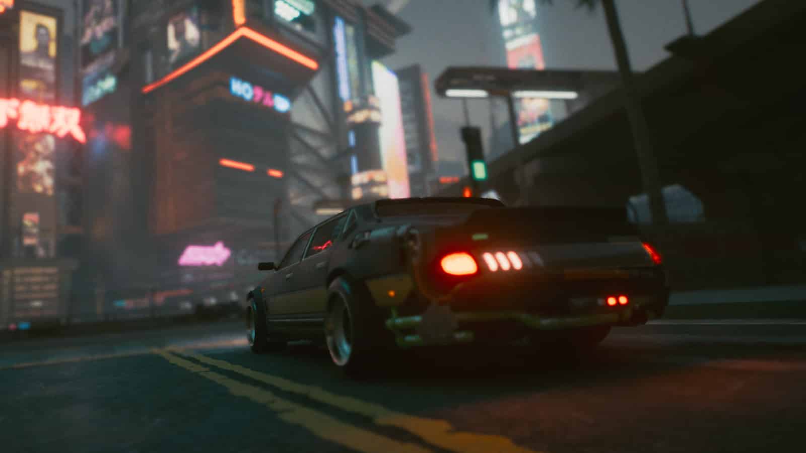A car driving through Night City at night time in Cyberpunk 2077