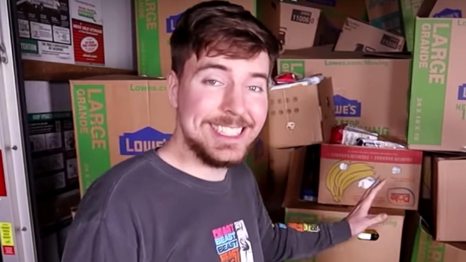 MrBeast stands in front of boxes
