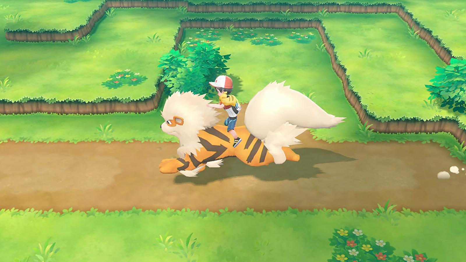 Screenshot of Pokemon Let's Go protagonist riding on top of an Arcanine.