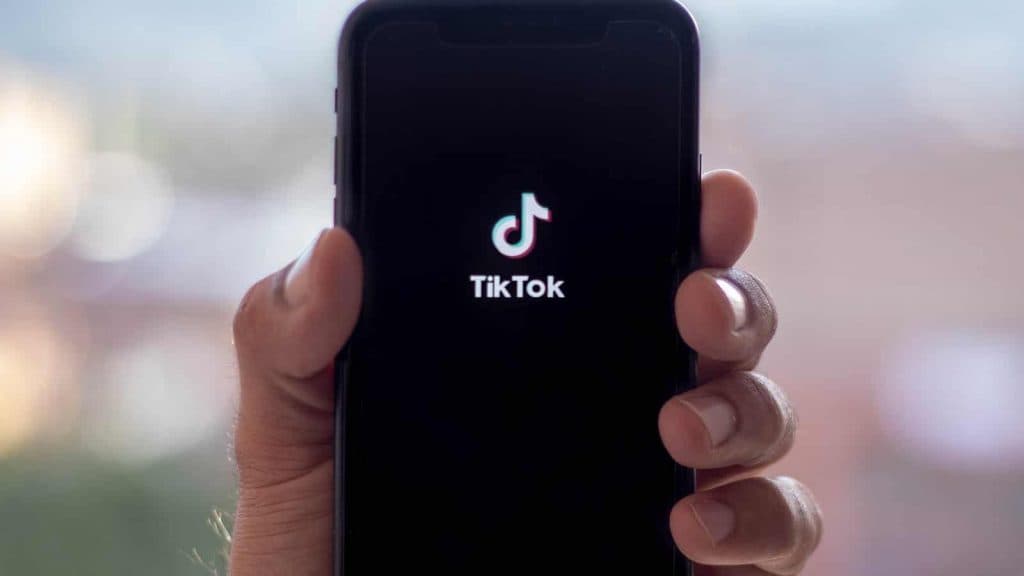 TikTok phone in hand