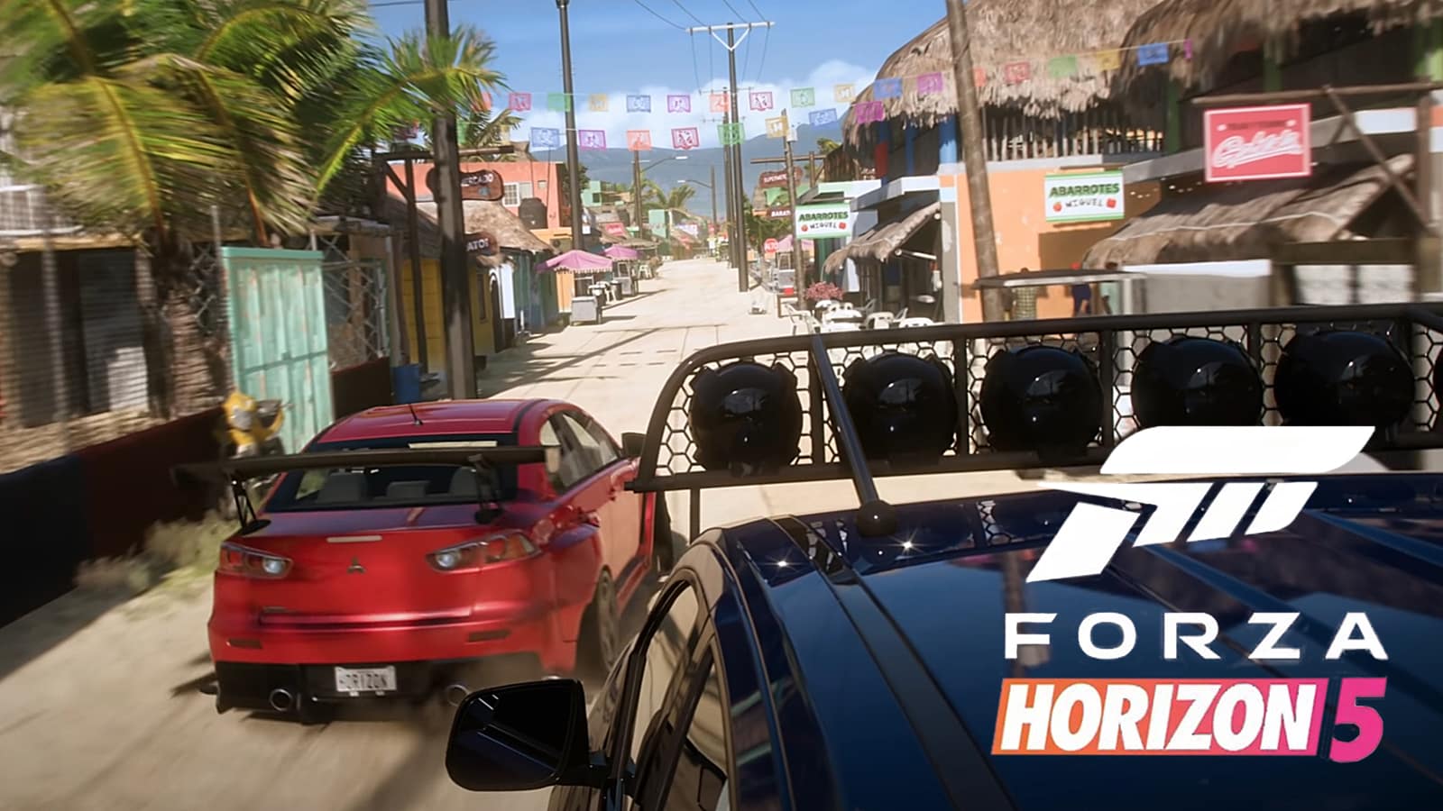 A screenshot of two cars driving through a street in the FH5 map.
