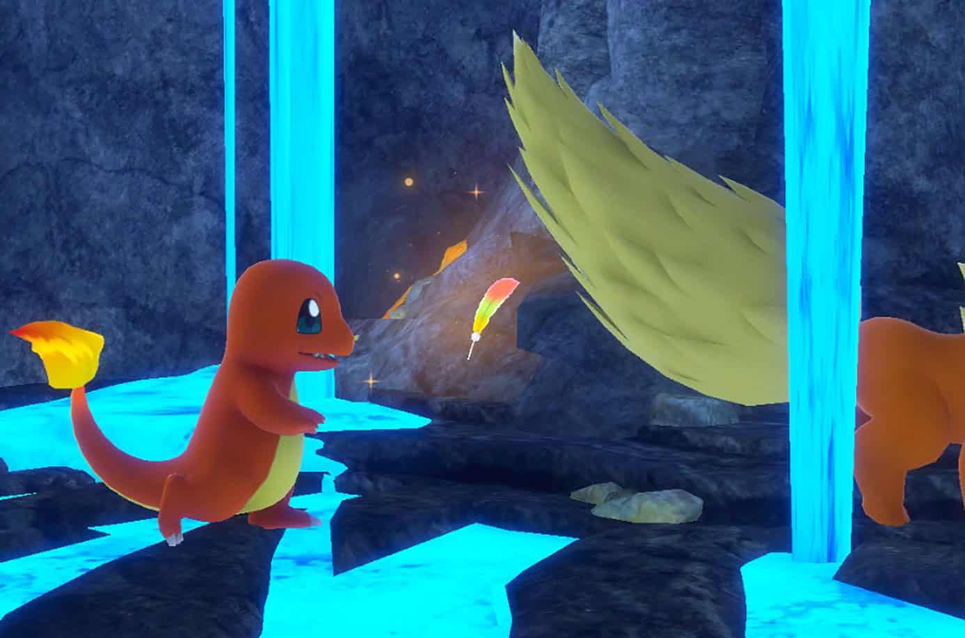 Charmander and Flareon next to Ho-Oh feather in New Pokemon Snap