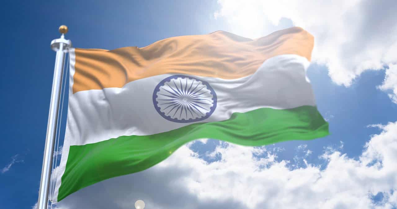 indian national flag flying against sunny background