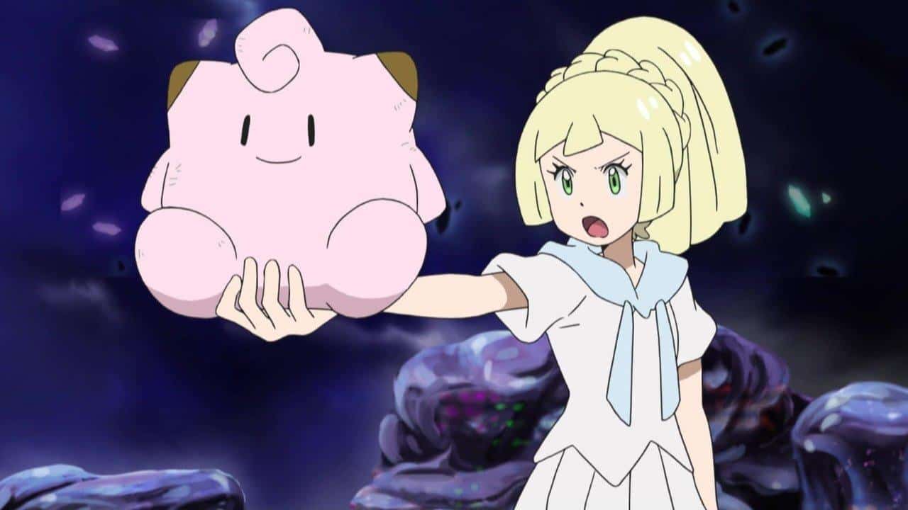 Pokemon character Lillie holding out Clefairy Plushy