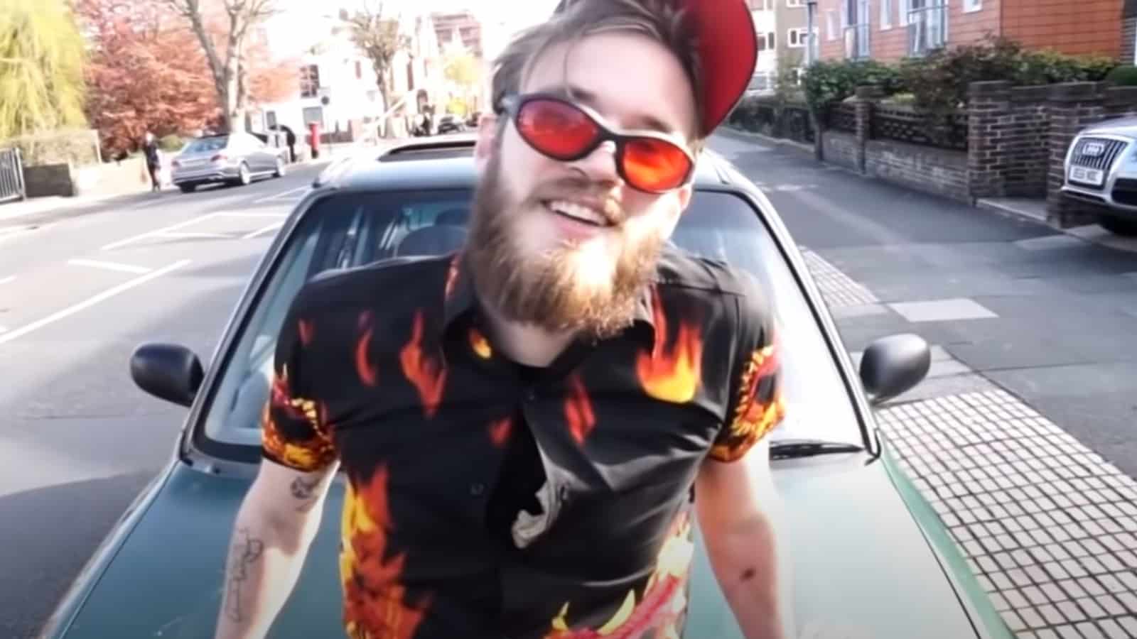 PewDiePie posing with his Nissan in 2016