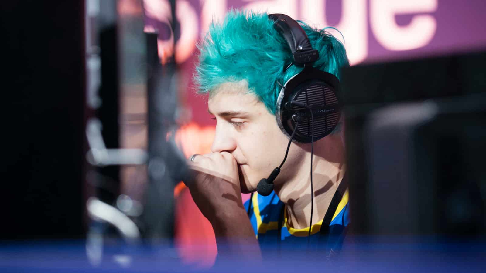 Ninja plays Fortnite on-stage at World Cup.
