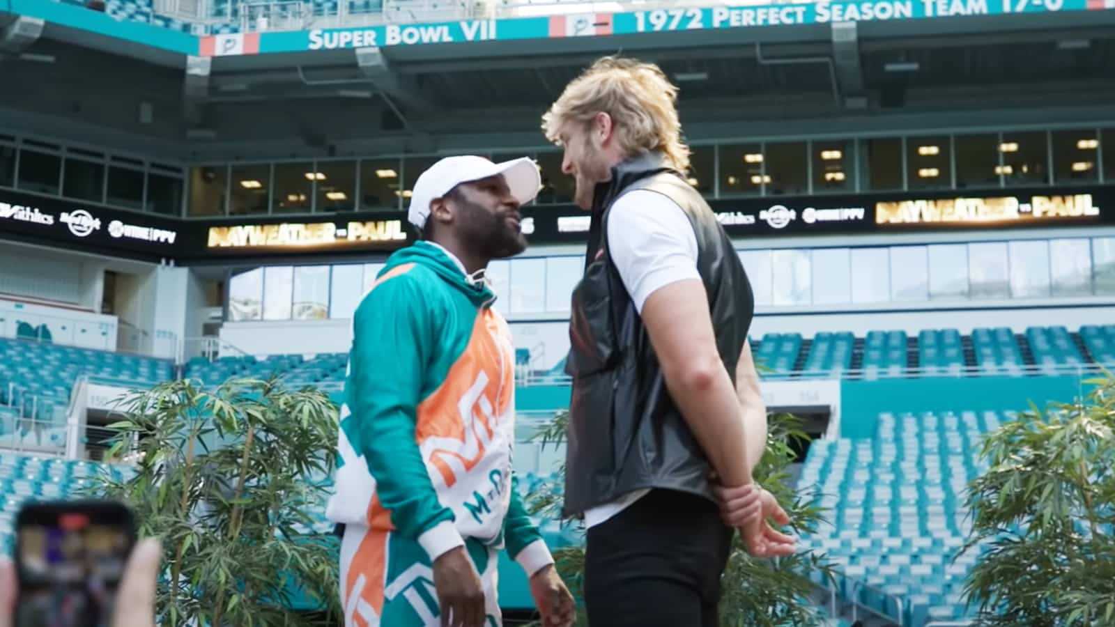 Logan Paul faces off with Floyd Mayweather
