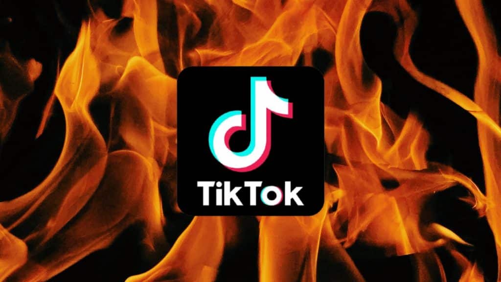 TikTok logo over some fire