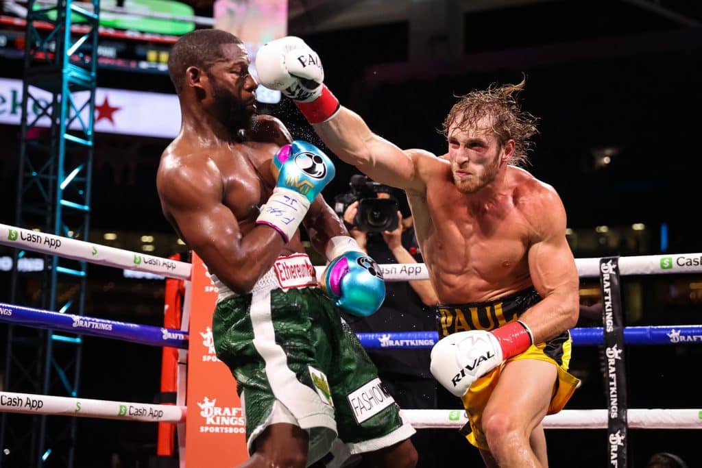 Logan Paul hits Mayweather with a powerful punch