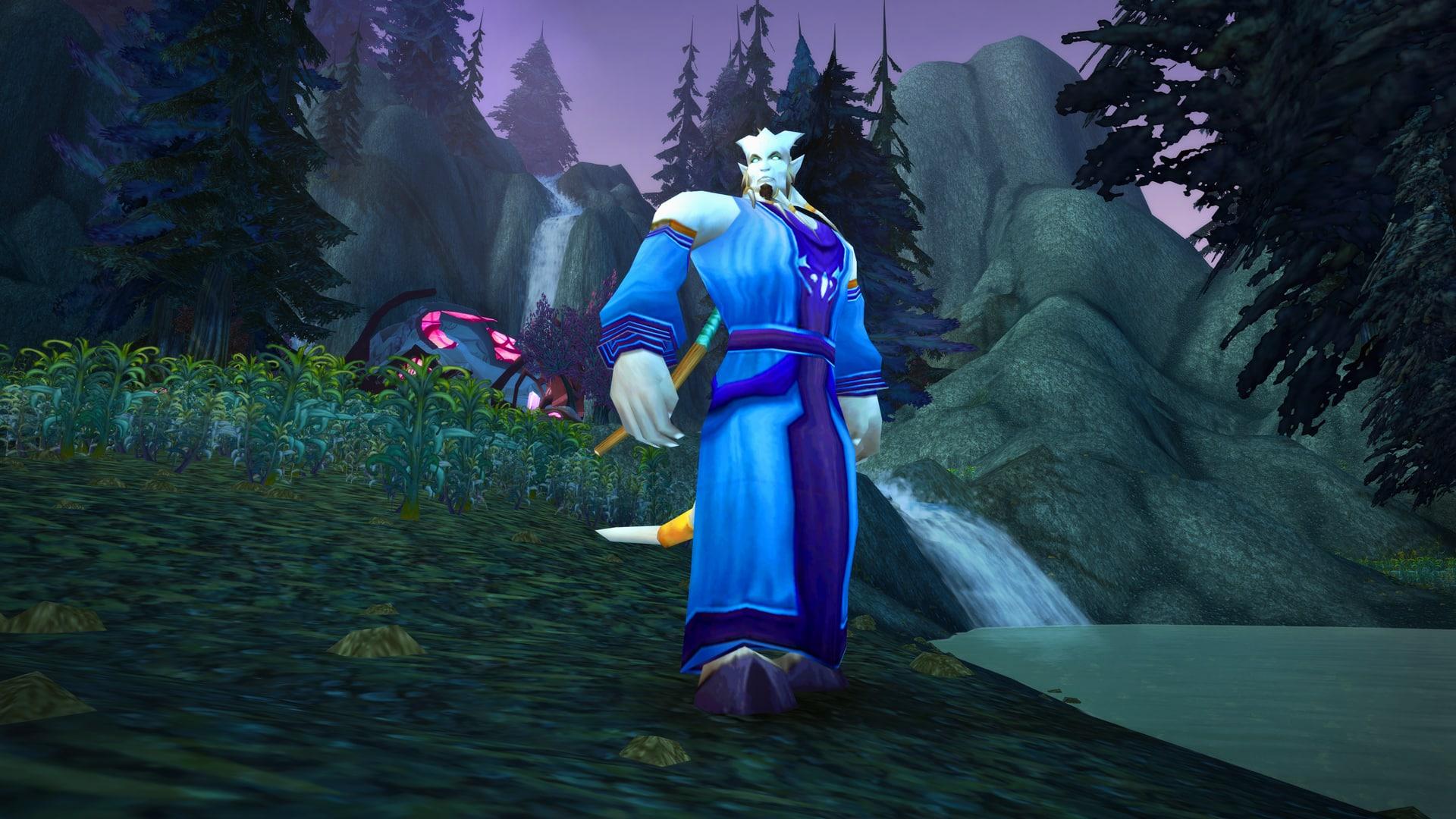 A Draenei standing by a lake in WoW Burning Crusade Classic