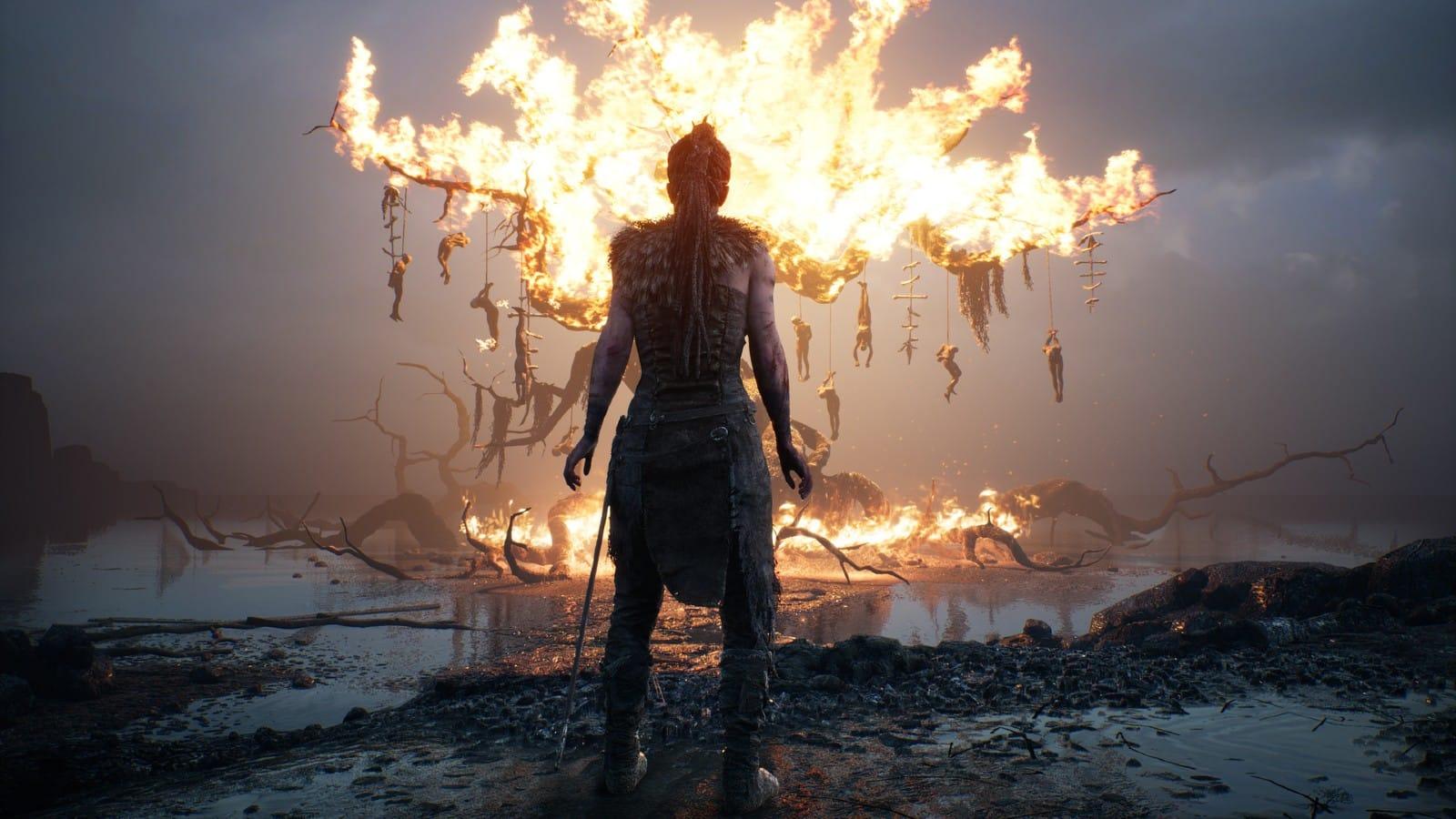 hellblade protagonist with burning tree