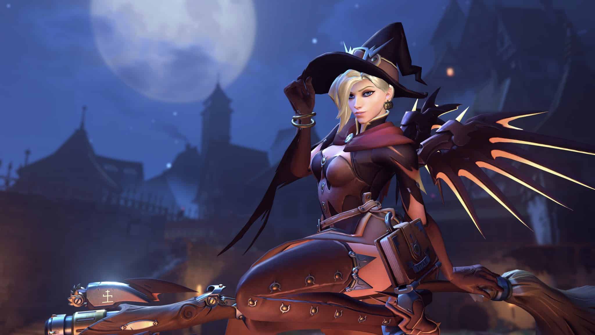 overwatch halloween mercy skin dressed as a witch on a broomstick in front of a creepy castle