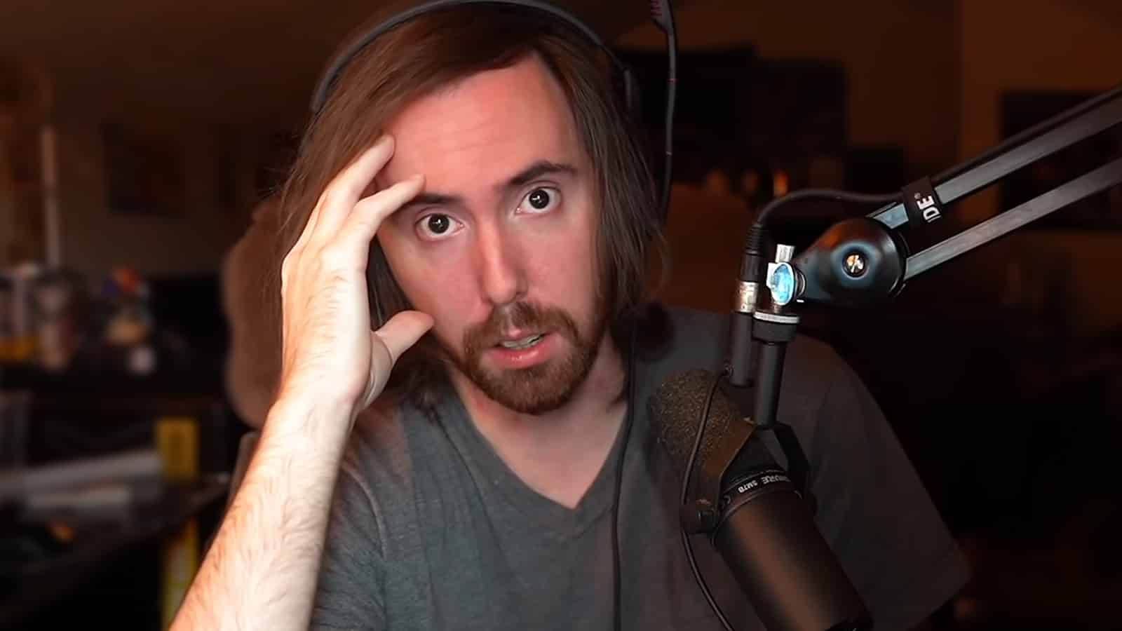 Asmongold staring into Twitch streaming camera.