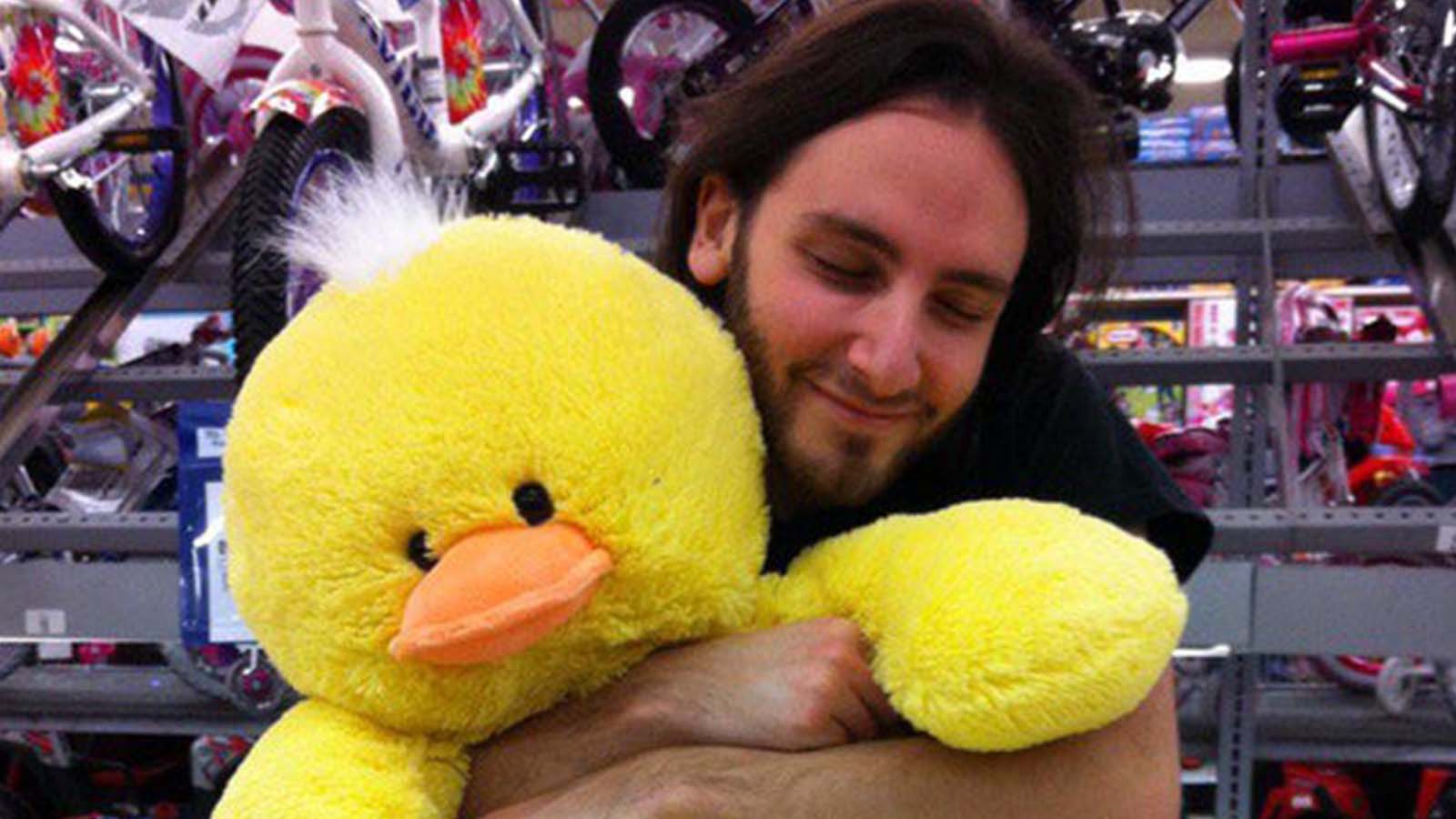 reckful holding his duck at the store
