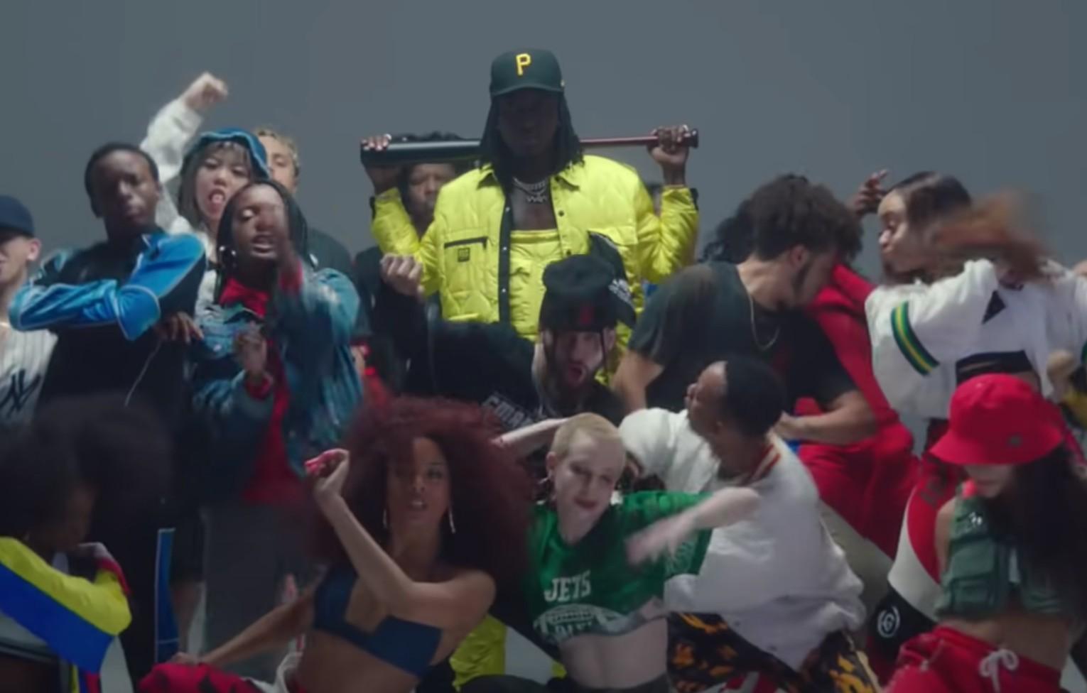 K Camp in the music video for Renegade