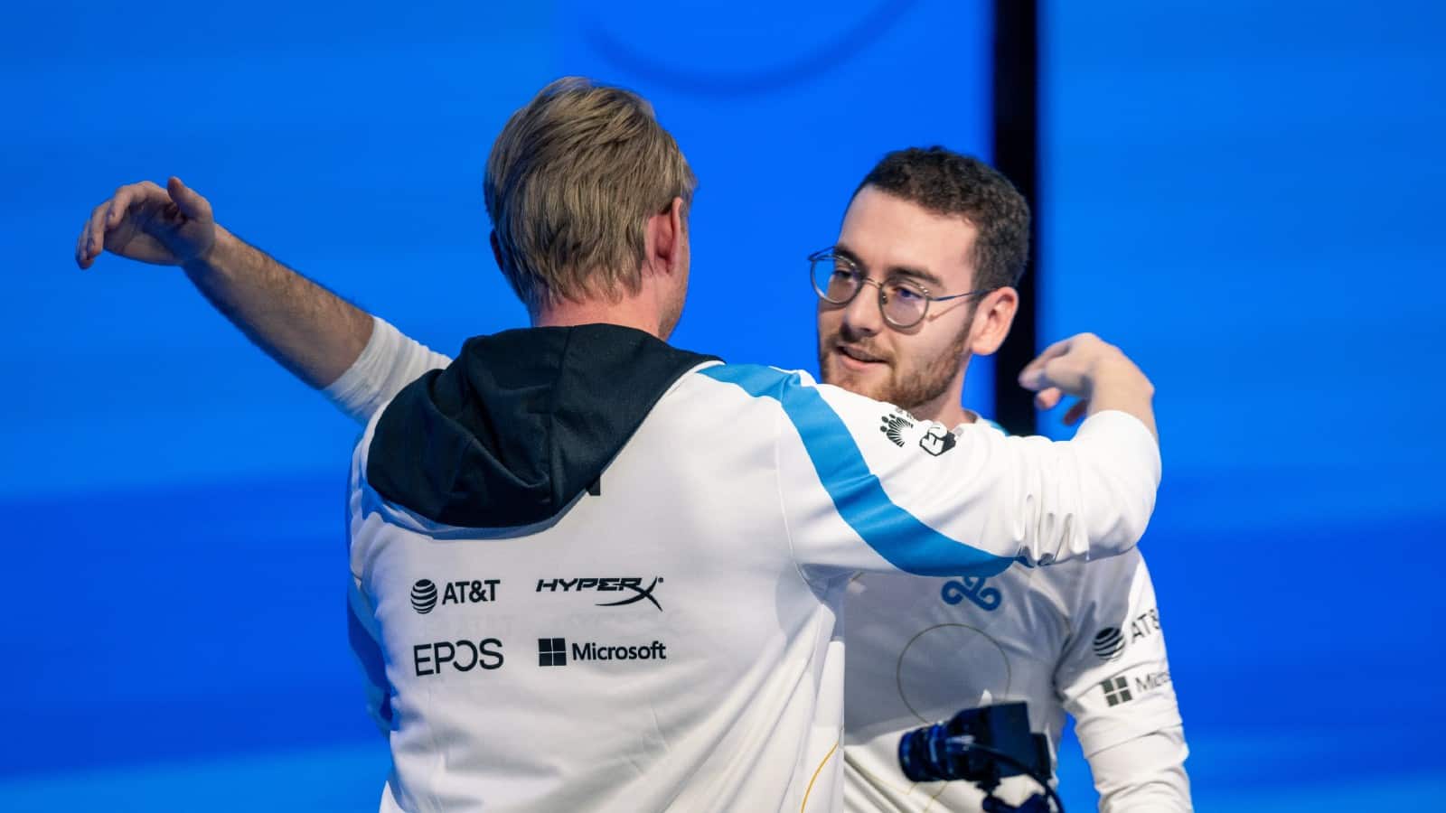 Zven and Vulcan of C9 embrace at Worlds 2021