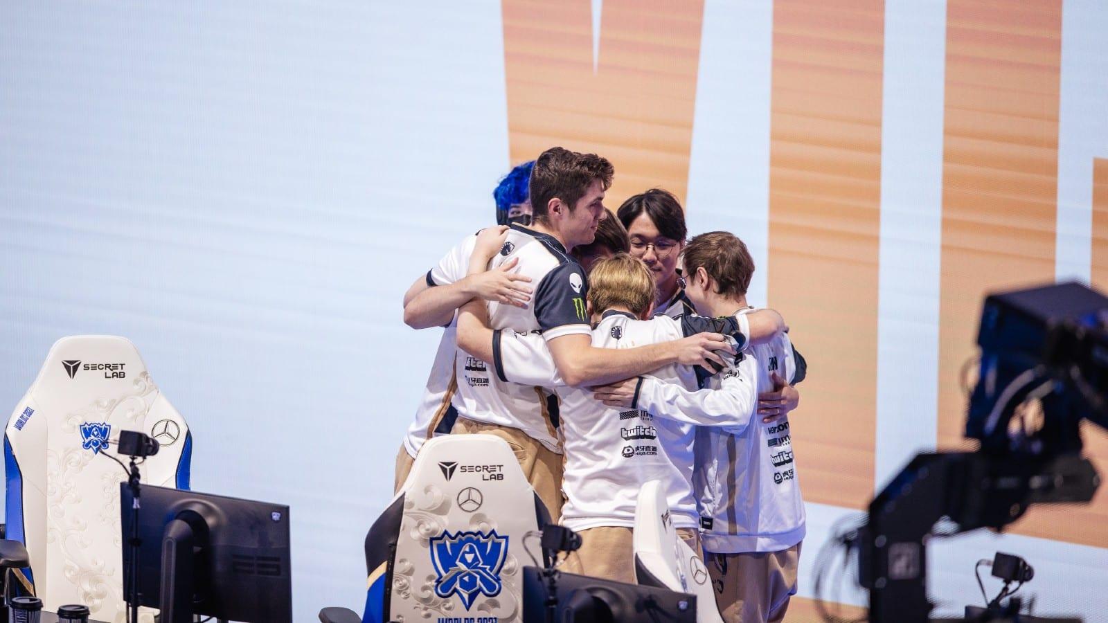 Team Liquid shares a group hug at Worlds 2021