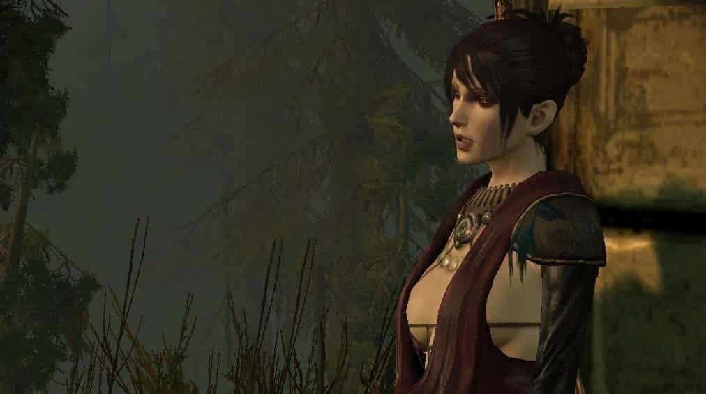 Dragon Age woman stands against a wall overlooking dark forest