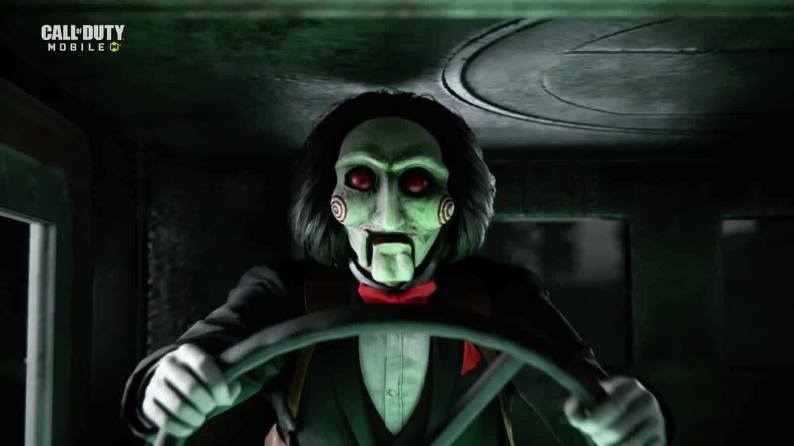 Billy the Puppet from the SAW franchise driving a truck in CoD Mobile.
