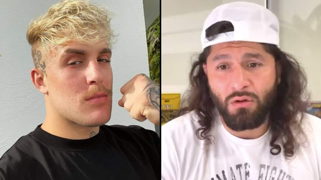Jake Paul with fist in the air alongside Jorge Masvidal